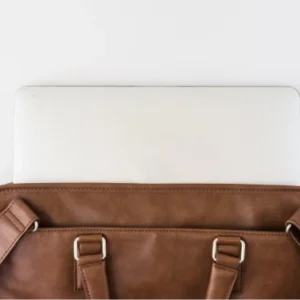Brown briefcase with tablet